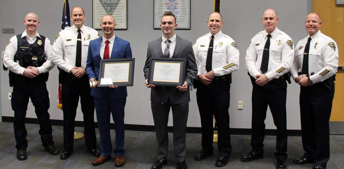 New O’Fallon Police Department officers Mike Shewmaker and Hayden Schaefer were sworn in Jan. 10. From left, Lt. Nick Stewart, Police Chief Kirk Brueggemann, Shewmaker, Schaefer, Capt. Dave Matevey, Lt. Patrick Feldhake and Capt. Mike Mojzis.