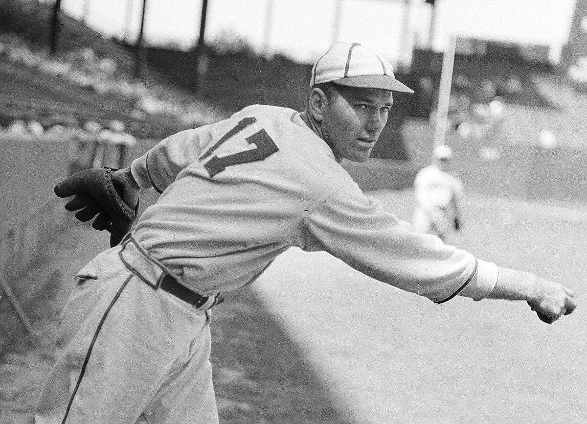 St. Louis Cardinals’ pitcher Dizzy Dean warms up for a game with the Brooklyn Dodgers at Sportsman’s Park, St. Louis, June 3, 1936.