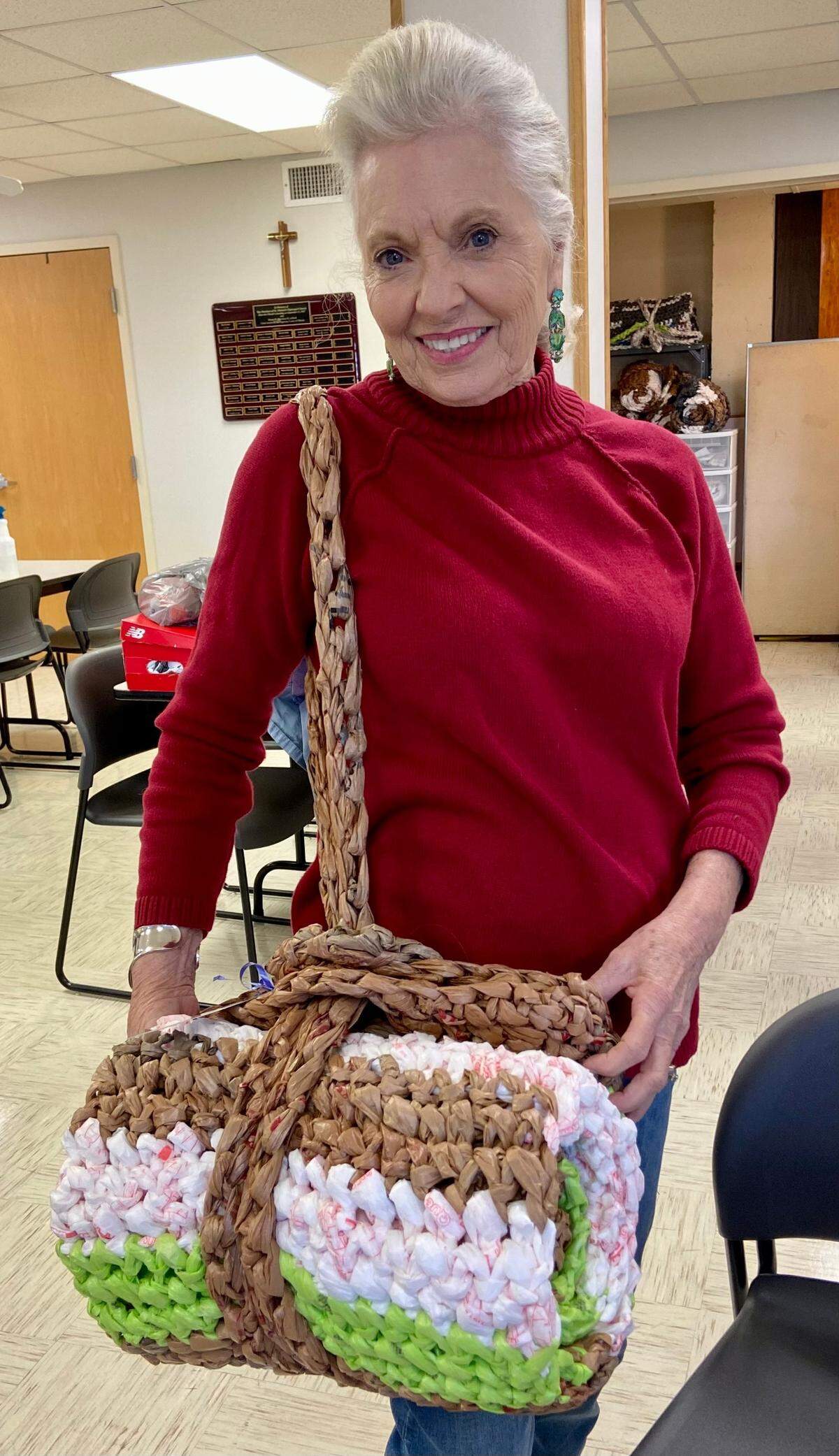 Judy Payne shows the mats that the women make out of recycled plastic grocery bags that can be rolled up and carried. Volunteers like Payne gather Thursday mornings at St. Michael’s Episcopal Church in O’Fallon to prepare mats that are given to people who are houseless. Payne actually helped get the project off the ground, along with her husband, Tom.
