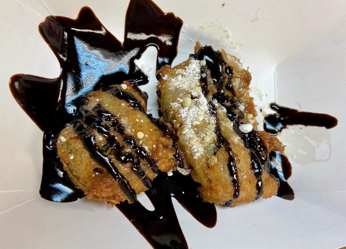 Fried Oreos topped with bacon and powdered sugar were a big hit at the Sugarfire Smokehouse food truck at the annual BaconFest on Saturday, Sept. 10. The O’Fallon VFW Post 805 Auxiliary has sponsored this event 2016 to help raise funds for veterans in need.