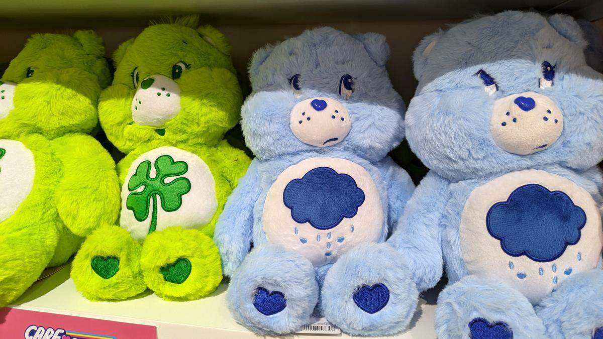 Close-up look of Care Bears (Good Luck Bear and Grumpy Bear) at MINISO at St. Clair Square