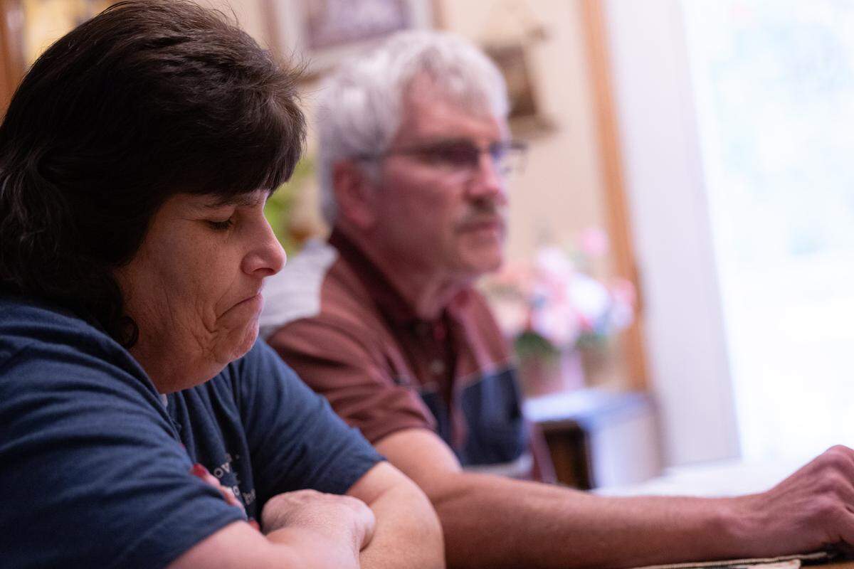 Toni Link gets emotional as her husband, Kevin, talks about their youngest child, Naomi Link, who died by suicide in 2024. “He was a light in the darkness,” Kevin said.