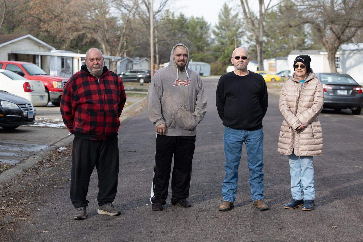 Greenmount Station mobile home park neighbors, from left to right, Matthew Clevenger, Michael Montgomery, Jim Hodgkins and Patty Totty share concerns about recent notices telling tenants they can either buy their trailers or move out by the end of their leases because the owner will no longer be renting.