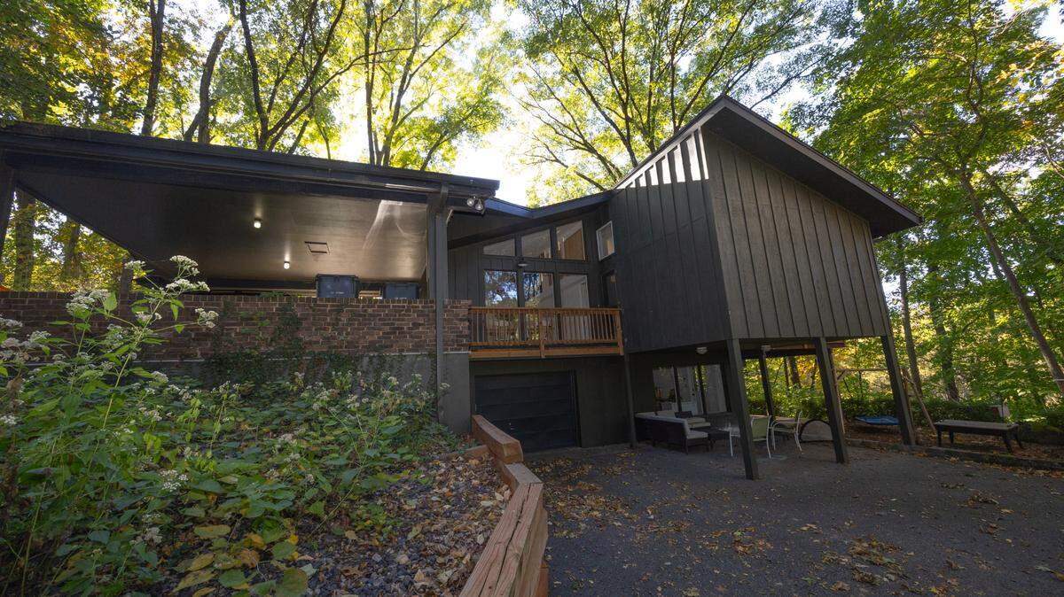 The stilted patio and rear portion gives what Candice Jackson calls a “treehouse vibe” to her Belleville home.