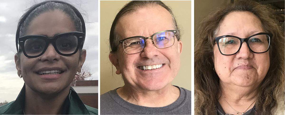 Voters Terrilyne Cole, left to right, Guy Cantonwine and Rebecca Ferguson, all of O’Fallon.