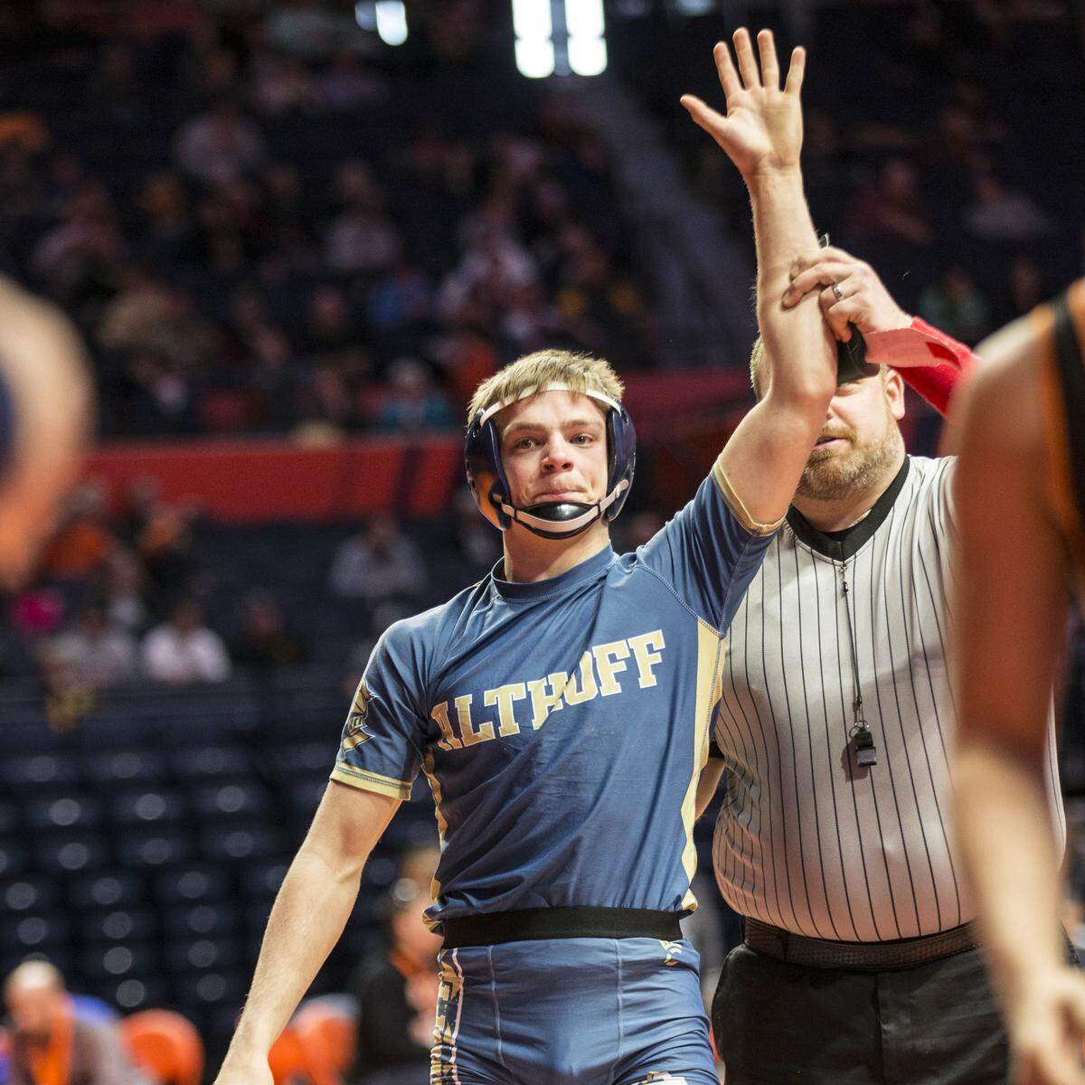 Althoff’s Max Kristoff won his preliminary match with a pin 36 seconds into the first period at the Illinois High School Association opening day of state wrestling. (Photo: PhotoNews/Chris Johns)