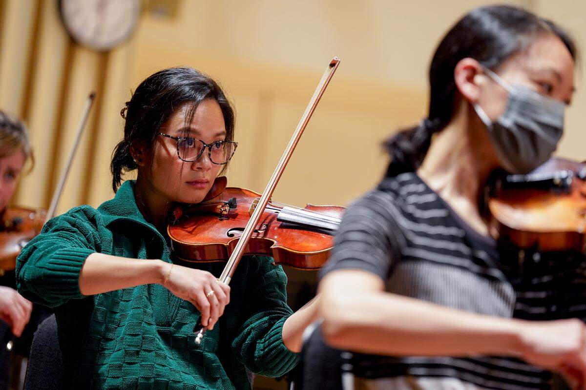 St. Louis Symphonic Orchestra violinist Hannah Ji rehearses James Lee III’s “Visions of Cahokia” ahead of its world premiere on Wednesday, Jan. 25, 2023, at Powell Hall in Grand Center. 