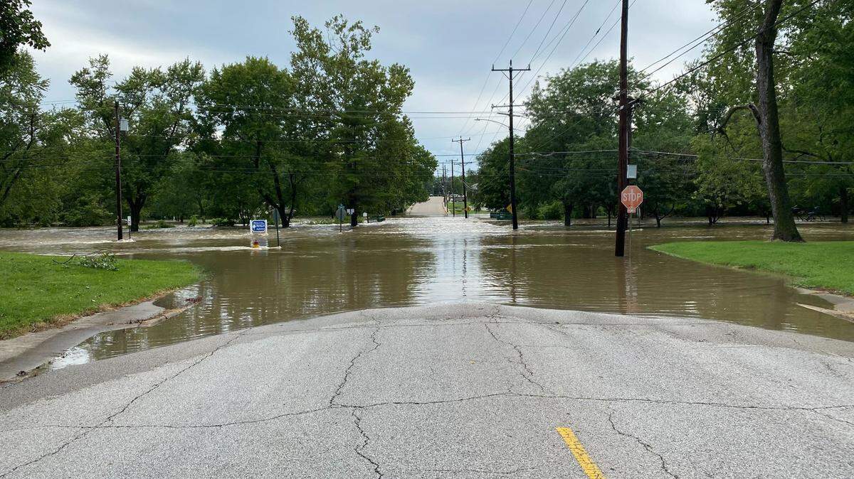 The flooded intersection of W. F Street and N. 2nd Street in Belleville, Ill., on July 16, 2024.