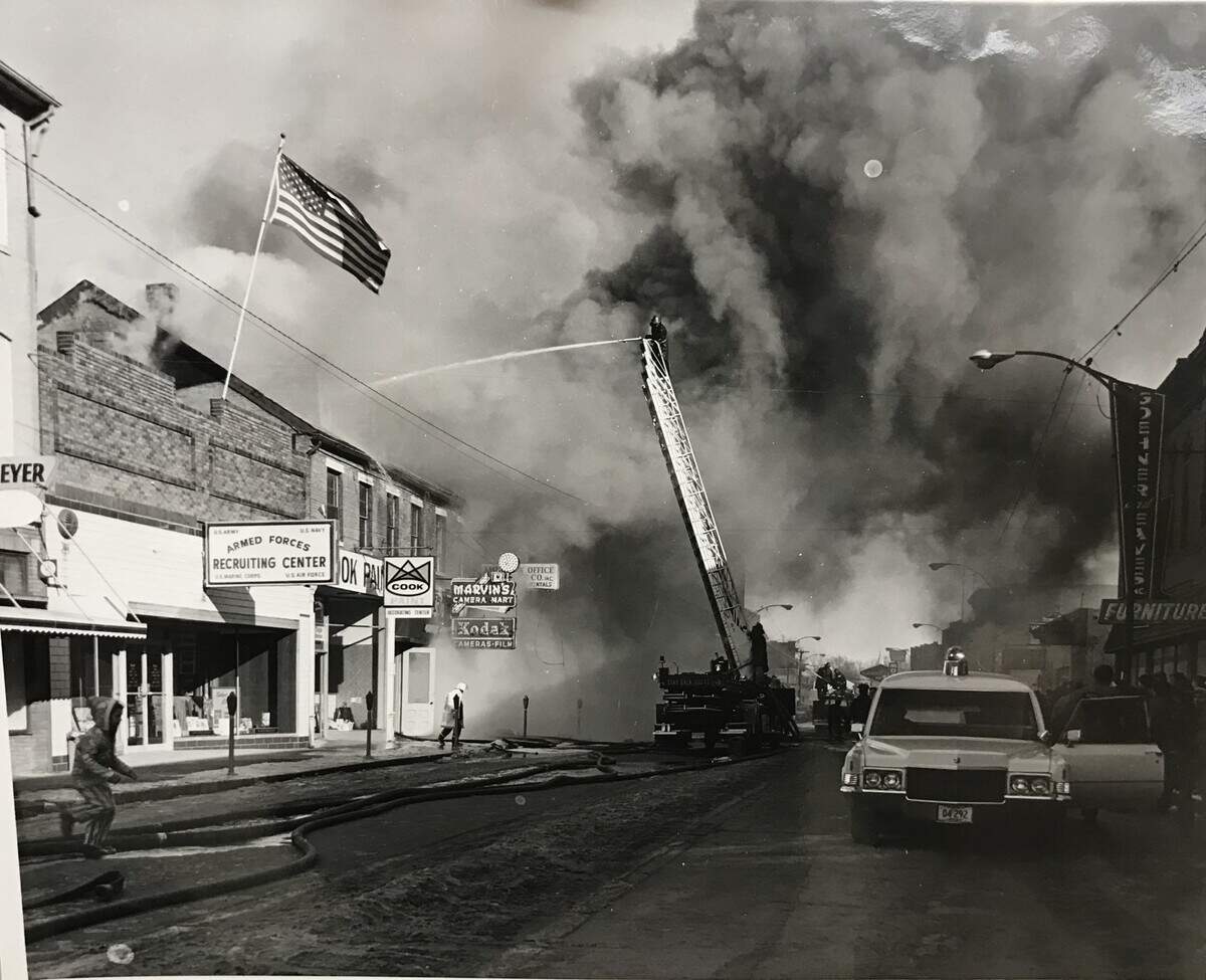 Firefighters work to extinguish a blaze at Liese Lumber Co. at 319 E. Main St. in Belleville in 1972.