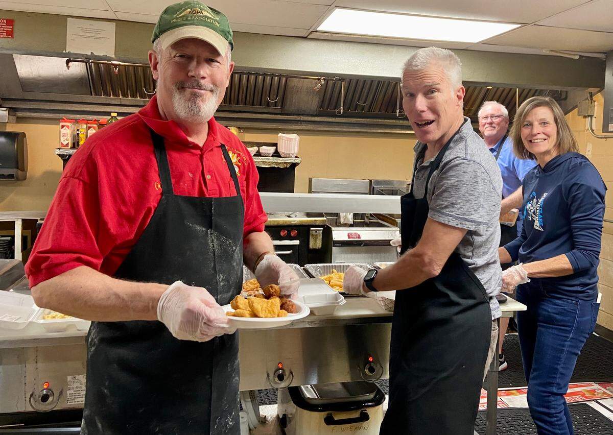 Volunteers and staff at the O’Fallon Knights of Columbus Hall are gearing up for the biggest fish fry in town this Lenten season, and have extended Friday dinner service to 8 p.m. Pictured are KC members working in the kitchen: Cris Armstrong, Don Gravlin, Patti Daniels and Denny Wieman.