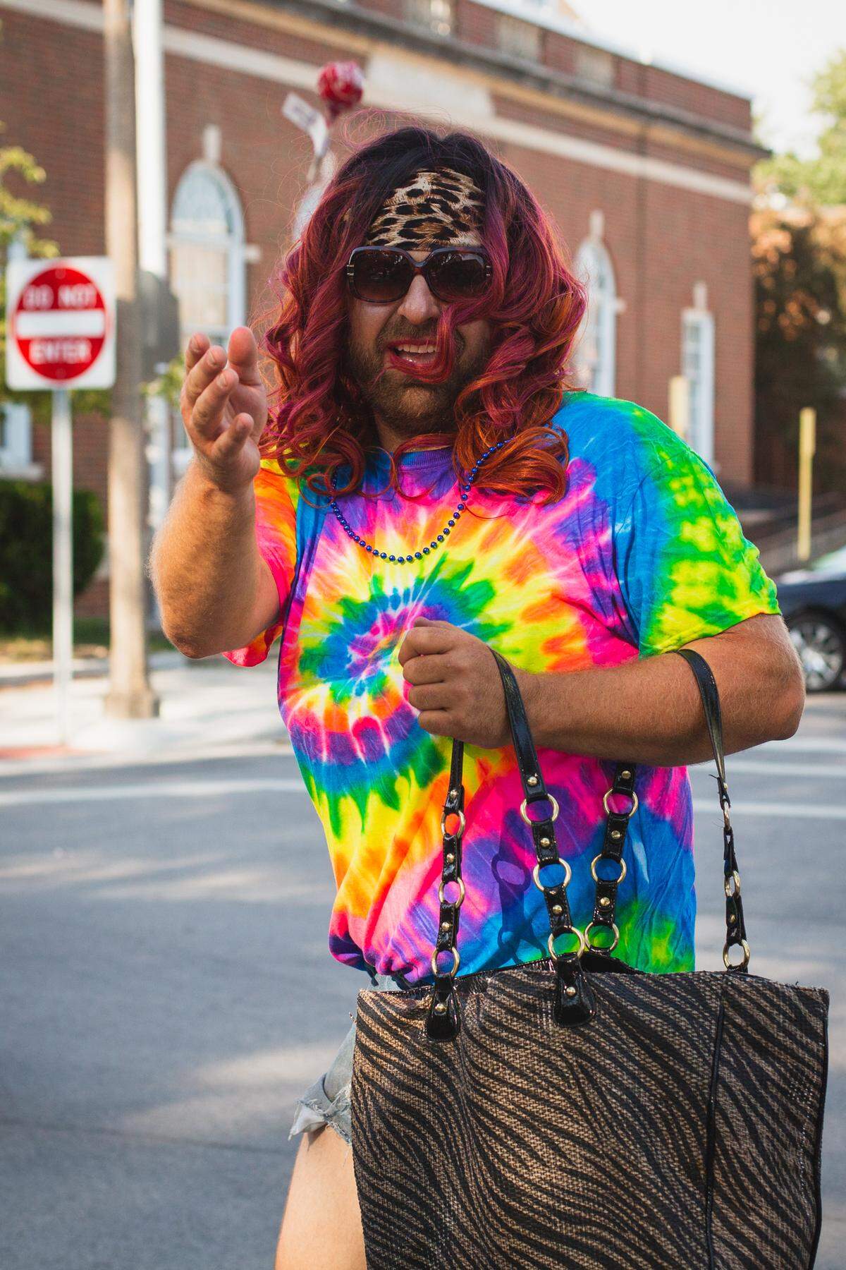 Chad “Cheetah” Zobrist throws some candy during the 2018 Schweizerfes parade. The 2019 Ms. LOL Pageant contestants made their debut during the parade. The pageant is sponsored by Leaps of Love, and until the May 11 event, the 12 contestants will be working in different ways throughout the community to raise awareness about childhood cancer.