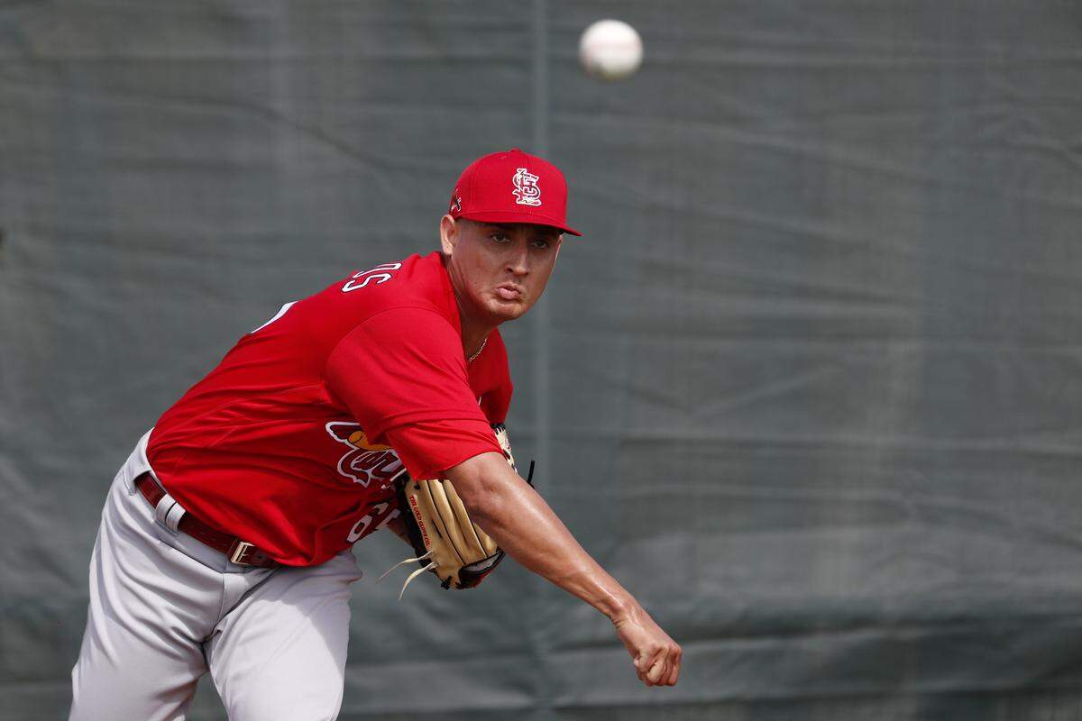 St. Louis Cardinals pitcher Giovanny Gallegos throws during spring training baseball practice in 2020. Gallegos is part of a Redbirds bullpen that has struggled thus far in 2022.