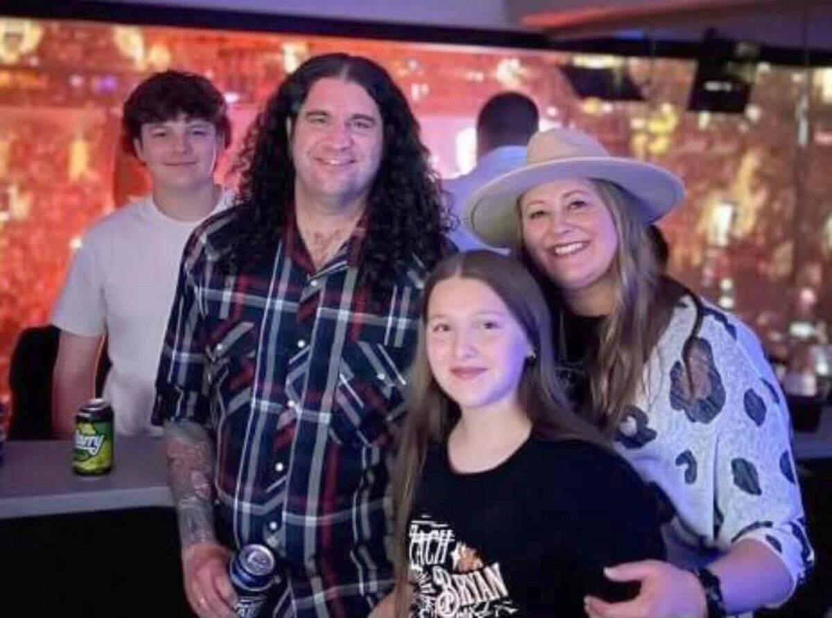 Hoelting Family at Enterprise Center for the May 2 Zach Bryan concert. From left, Rainn, dad Ryan, mom Kelly and daughter Elliott.