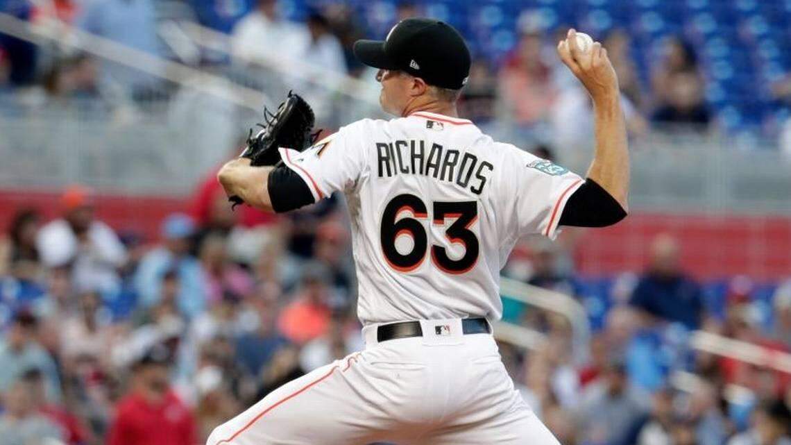 Miami Marlins starting pitcher Trevor Richards throws in the first inning during a baseball game against the Boston Red Sox on Monday, April 2, 2018, in Miami.