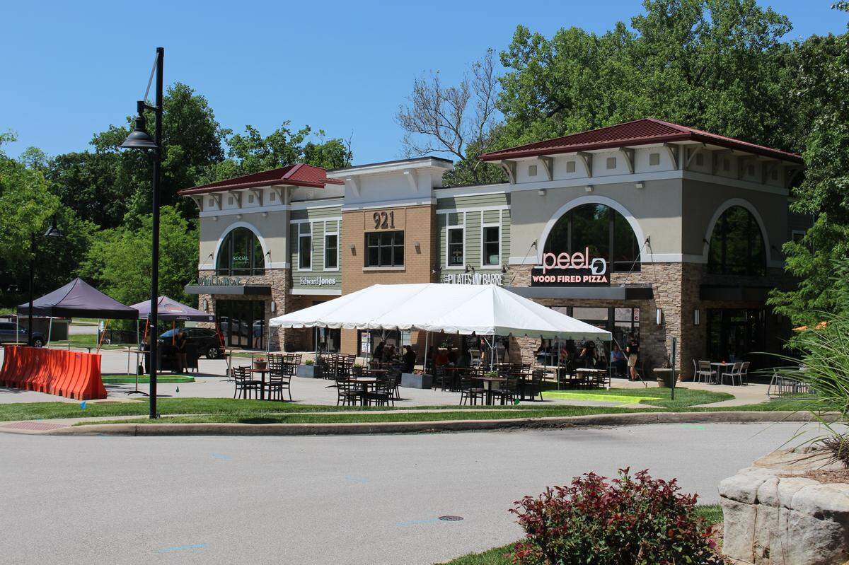 Peel Wood Fired Pizza in Edwardsville can seat about 80 people in its new outdoor dining area, which the owners created by expanding patio seating into the parking lot.