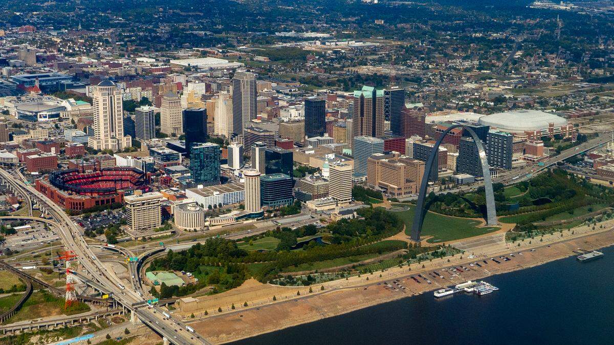 The Gateway Arch and St. Louis skyline is seen from a C-21 jet on Friday, Oct. 7, 2022, while flying over the Mississippi River.