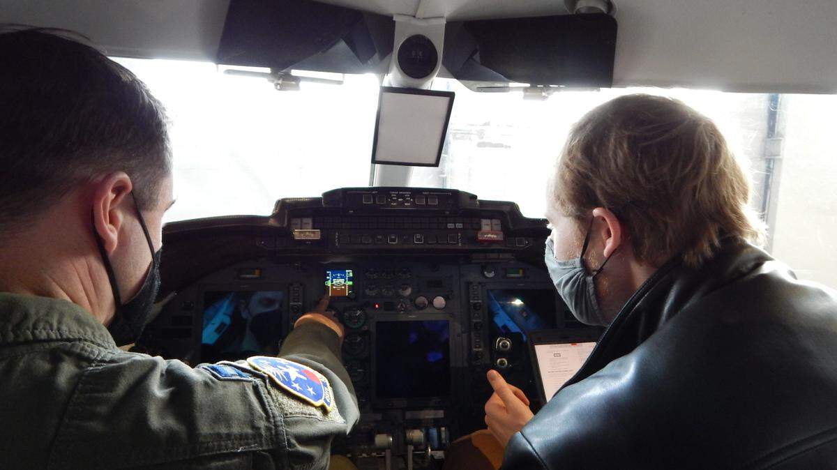 C-21 pilot Capt. Chandler Thorpe, 458th Airlift Squadron, and Washington University graduate student Kyle Gero go through a pre-flight checklist. Gero is a graduate student, who is collaborating with Scott’s Elevate innovation team and the squadron on a C-21 cockpit trainer project. The C-21 aircraft inventory went through an avionics upgrade in 2019, however, the training simulator uses the older cockpit configuration.