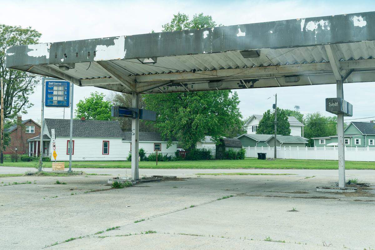 An old gas station that will be torn down is seen during a tour by Ed Hightower of a planned development on Tuesday, April 23, 2024, in Venice. The city of Venice plans to add a new grocery store, healthcare facility, affordable homes, and a new elementary school.