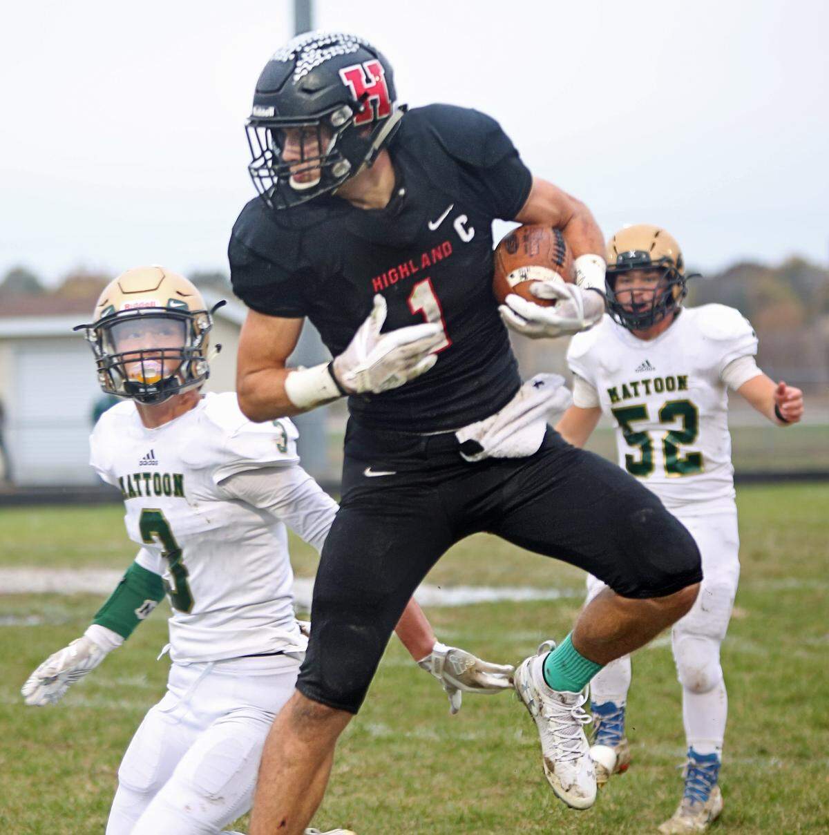Sam LaPorta comes down with one of his four catches during Highland’s win against Mattoon in the second round of the IHSA Class 5A state football playoffs in 2018. LaPorta now is gearing up for the NFL draft.