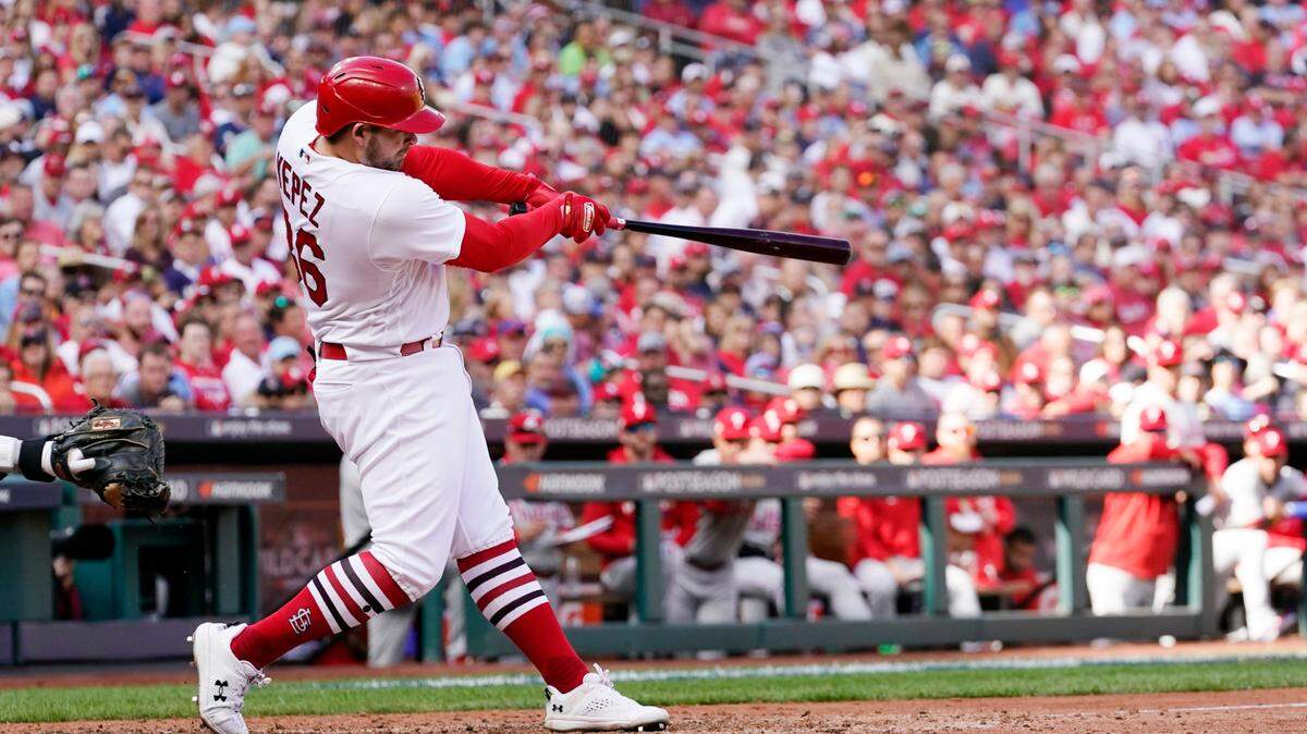 St. Louis Cardinals’ Juan Yepez hits a two-run home run during the seventh inning in Game 1 of a National League wild card baseball playoff series against the Philadelphia Phillies, Friday, Oct. 7, 2022, in St. Louis. (AP Photo/Jeff Roberson)