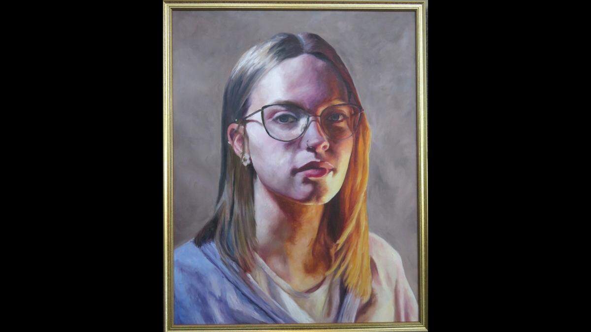 Teagan Holmes of Centralia High School won the Best of Show Award, a People’s Choice Award, an Artist’s Choice Award and a Wm. Evans Memorial Award for the oil artwork “Finding the Light” at Belleville’s 2024 Art on the Square.