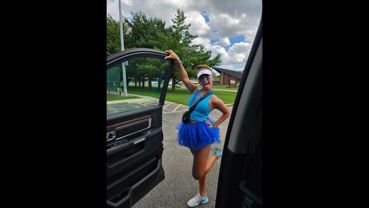Madeline “Maddie” Best shows her outfit for spirit week at O’Fallon Township High School.
