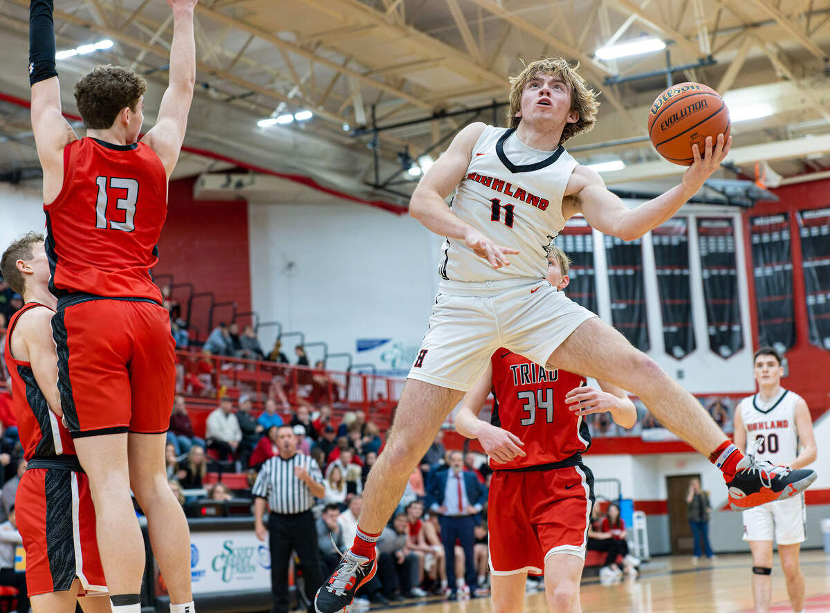 Highland’s Jake Ottensmeier lays the ball up during Friday night’s Mississippi Valley Conference game against Triad. The Knights ultimately posted a 50-37 victory.