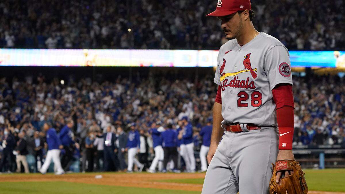 St. Louis Cardinals third baseman Nolan Arenado (28) leaves the field after the Los Angeles Dodgers won a National League Wild Card playoff baseball game 3-1 Wednesday, Oct. 6, 2021, in Los Angeles. (AP Photo/Marcio Jose Sanchez)