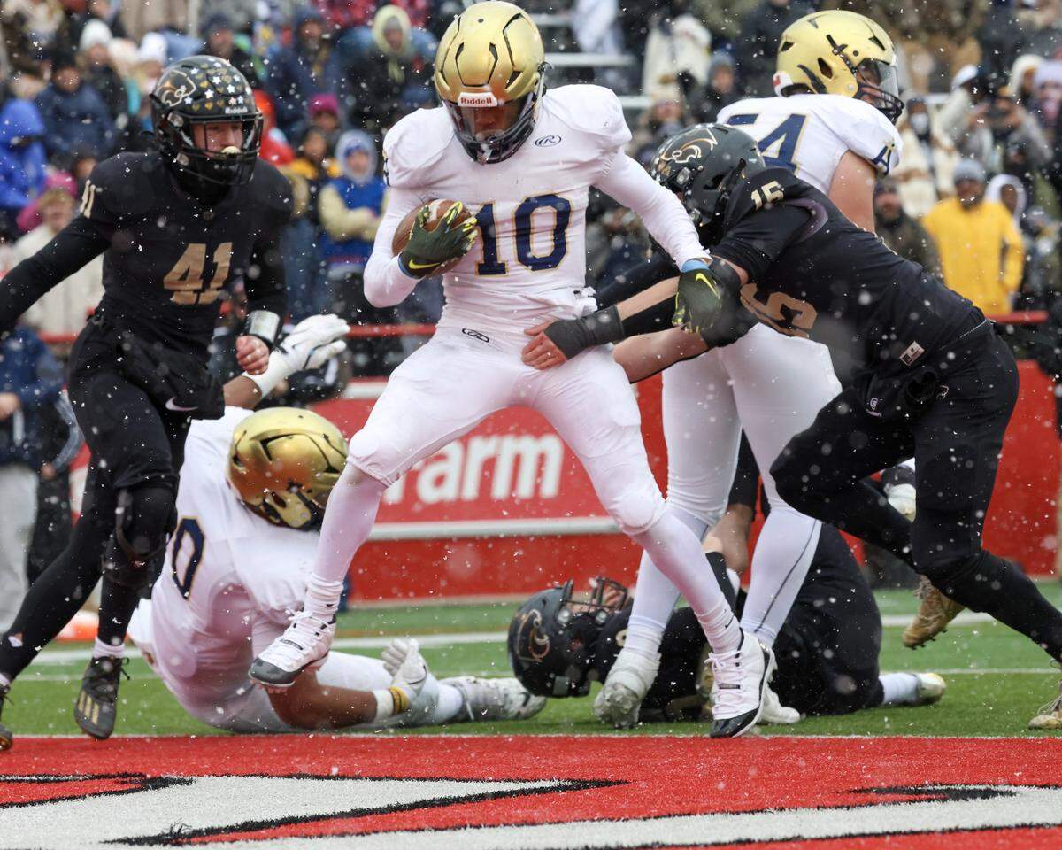 Althoff’s Dierre Hill Jr. scores one of his seven touchdowns during the Crusaders’ 57-14 win over Lena-Winslow for the IHSA Class 1A title at Hancock Stadium on the campus of the Illinois State University.