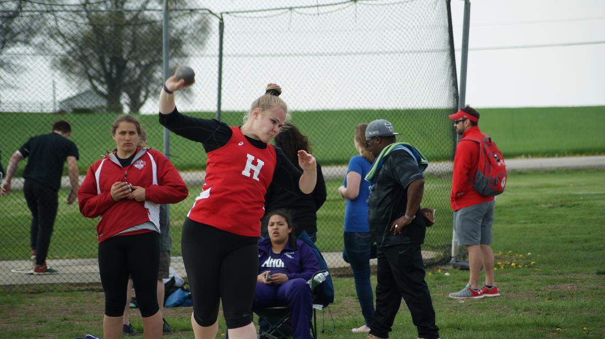 Highland junior Abby Beyer, shown throwing the shot put, placed in both throwing events in the large schools division of the Madison County Championships after taking fifth in the discus and seventh in the shot put Tuesday, April 24 at Highland High School.