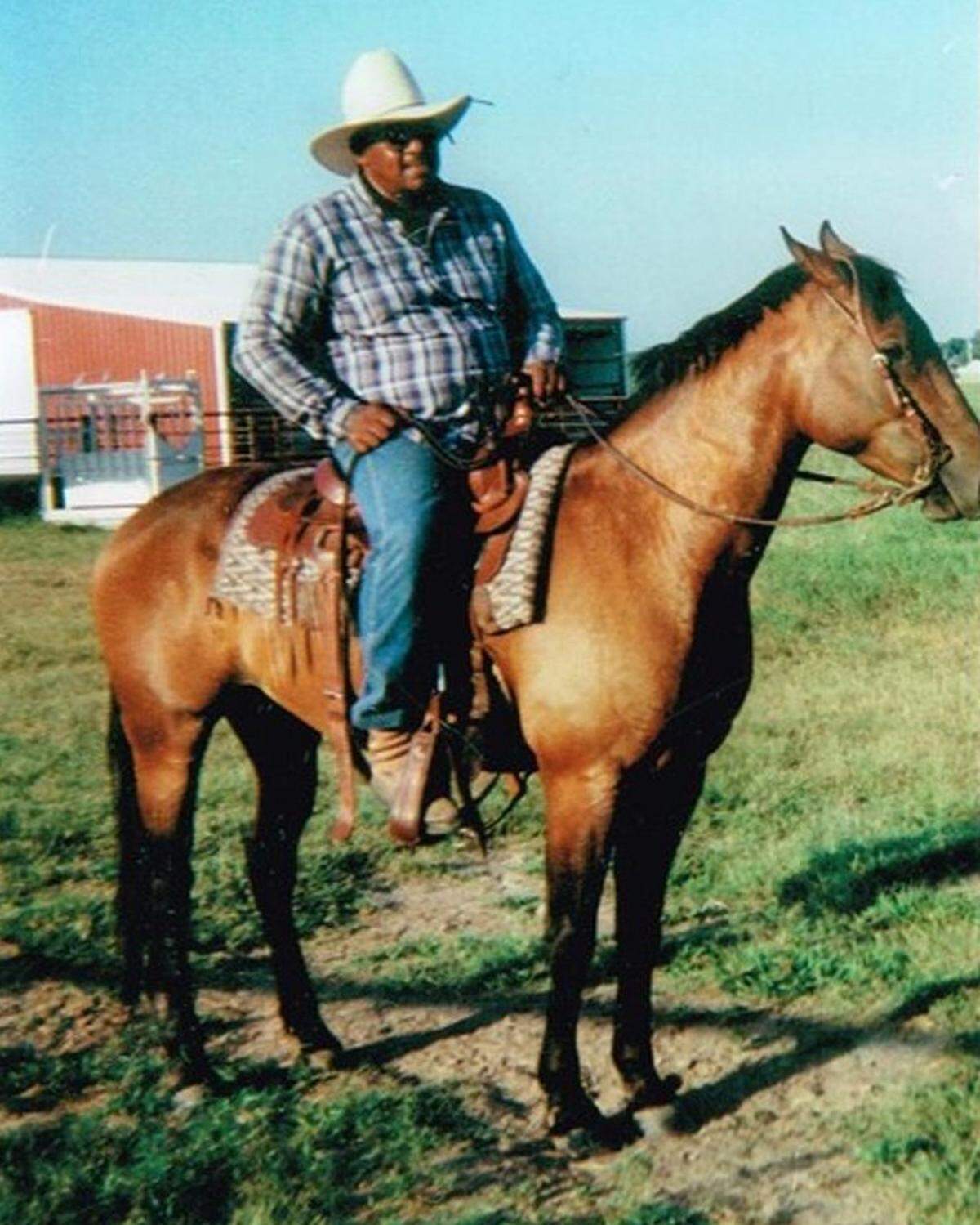 Joe Harrison on his horse at his cattle ranch outside Haskell, Oklahoma.