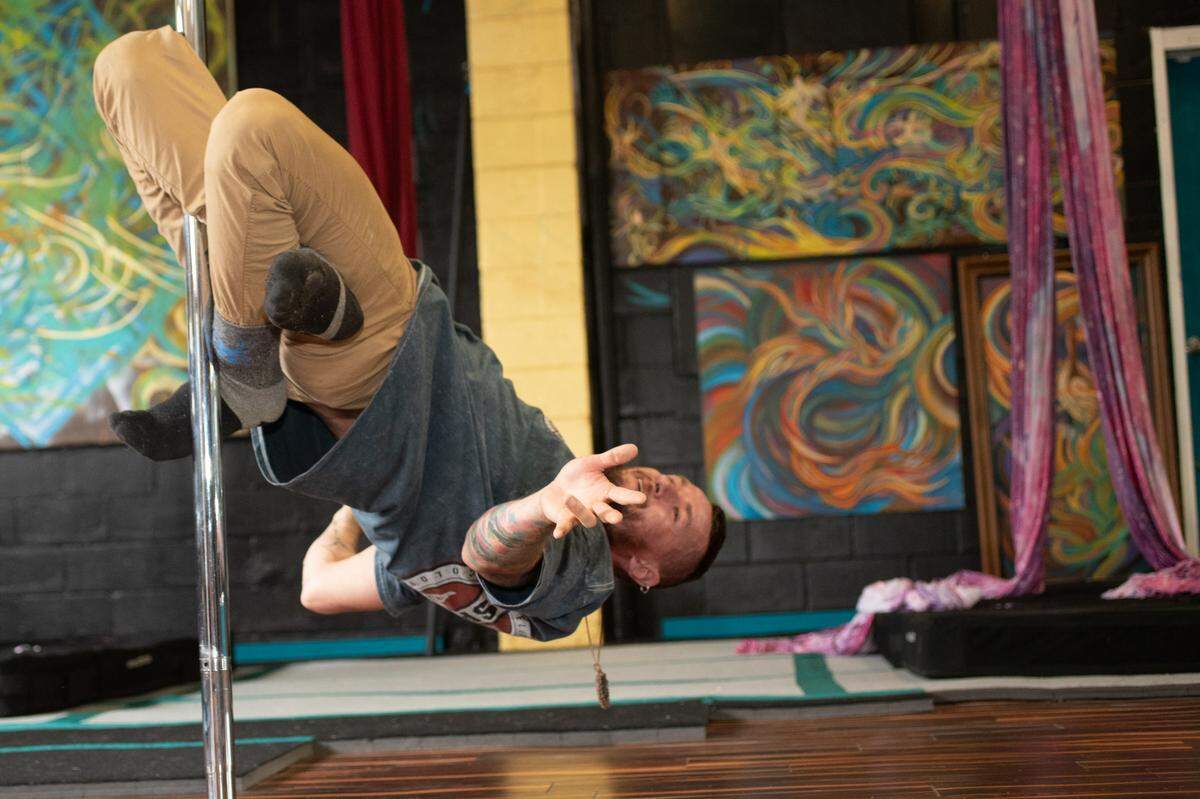 Brian Lynch demonstrates his aerial technique at his Belleville, Ill., studio, Valkyrie Aerial Arts.