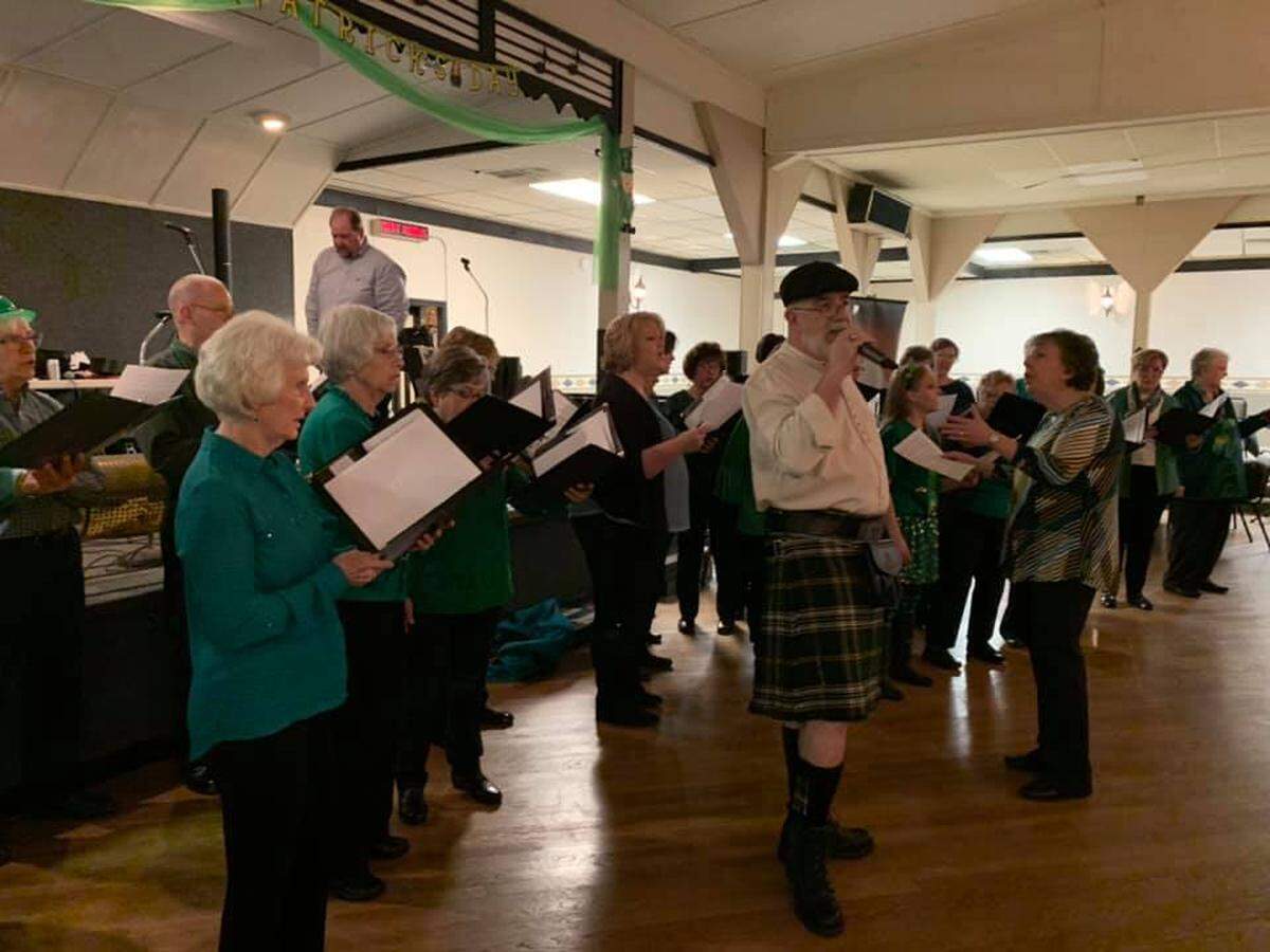 In this file phoot, Heartland Community Chorus members perform during the annual St. Paddy’s Party. The chorus, which presents three concerts a year, is set to celebrate their 10-year anniversary.