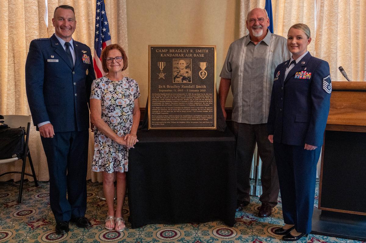 Scott Air Force Base leadership sits next to deceased Senior Airman Bradley Smith’s parents June 17 at a ceremony in the Essex House on Scott Air Force Base. The ceremony took place for Smith, and a room in the Chief Master Sgt. of the Air Force Bud Andrews Airman Leadership School dedicated to him for his courageous acts while deployed in Afghanistan.