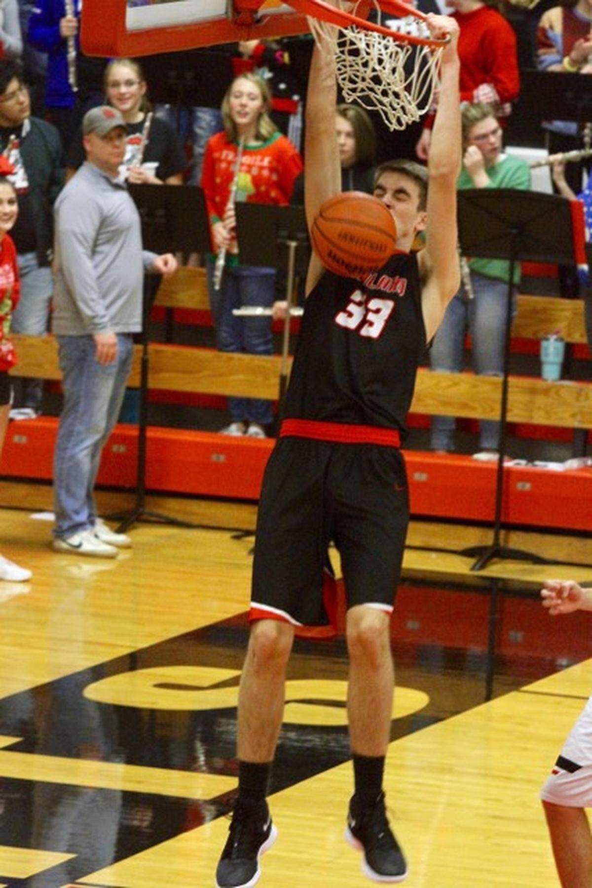 Highland’s Steven Torre was one of four Bulldogs to score in double figures in a rivalry win at Triad Friday.