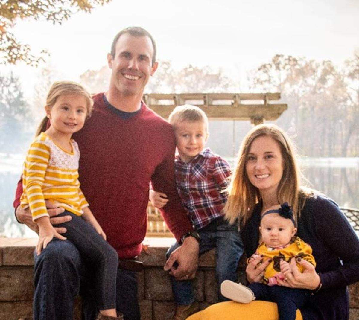 Trooper Nicholas Hopkins shown with his wife, Whitney, and their their children Evelyn and Owen, who are twins, and Emma.