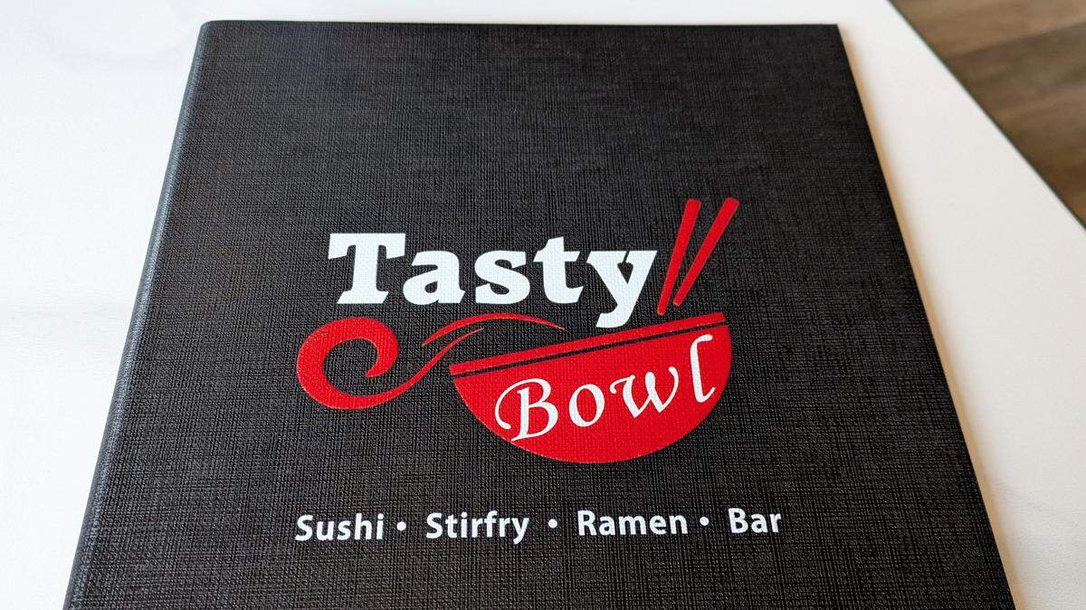 The menu at Tasty Bowl is ready, but owner Sean Lin wasn’t ready to go public with the specifics. So this look at the menu cover will have to do for now.