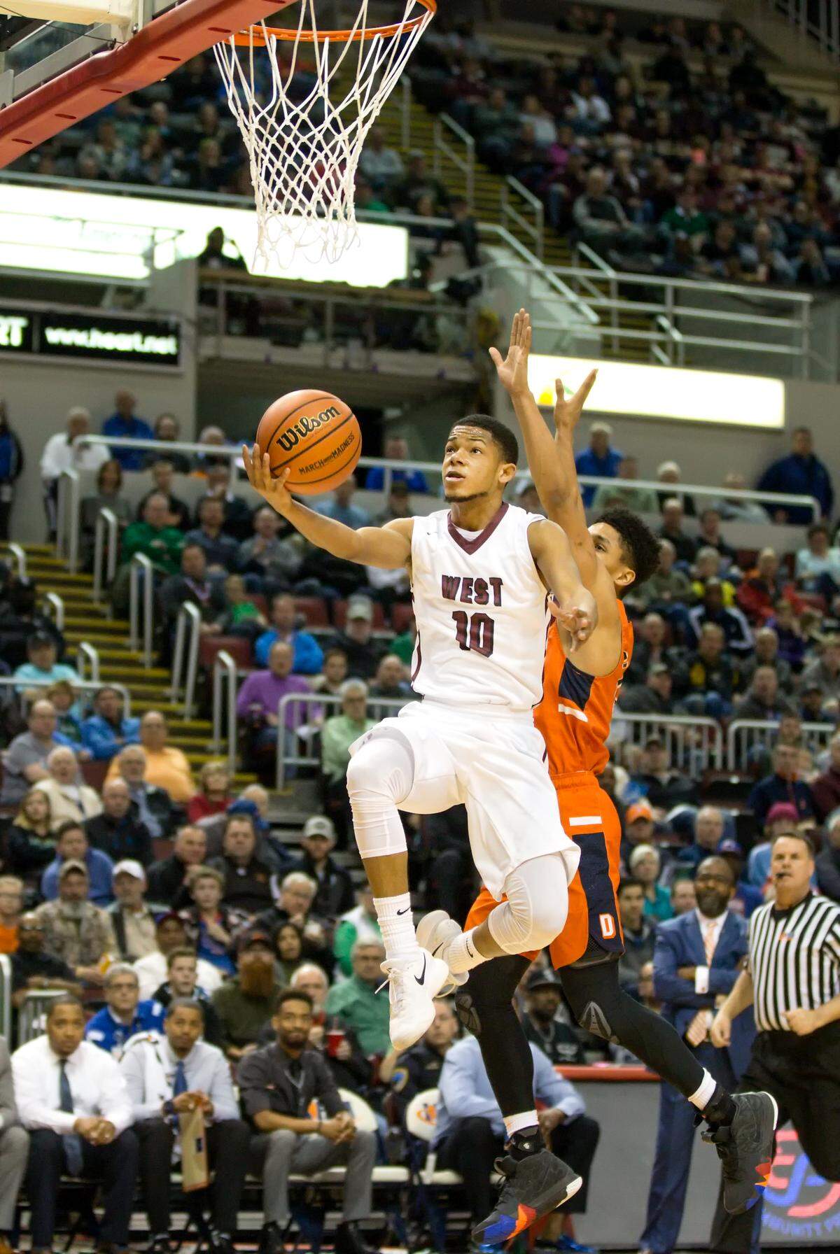 Belleville West’s Lawrence Brazil III goes up for a layup against Whitney Young during the IHSA Class 4A state championship game in March.