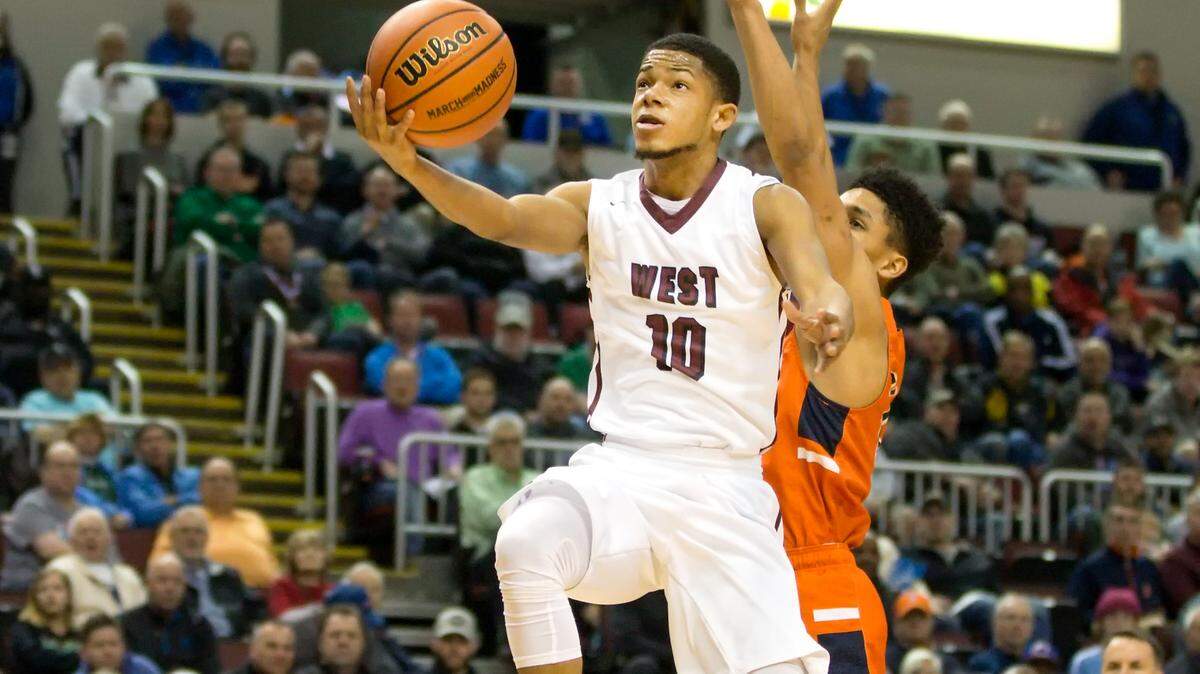 Belleville West’s Lawrence Brazil III goes up for a layup against Whitney Young during the IHSA Class 4A state championship game in March.