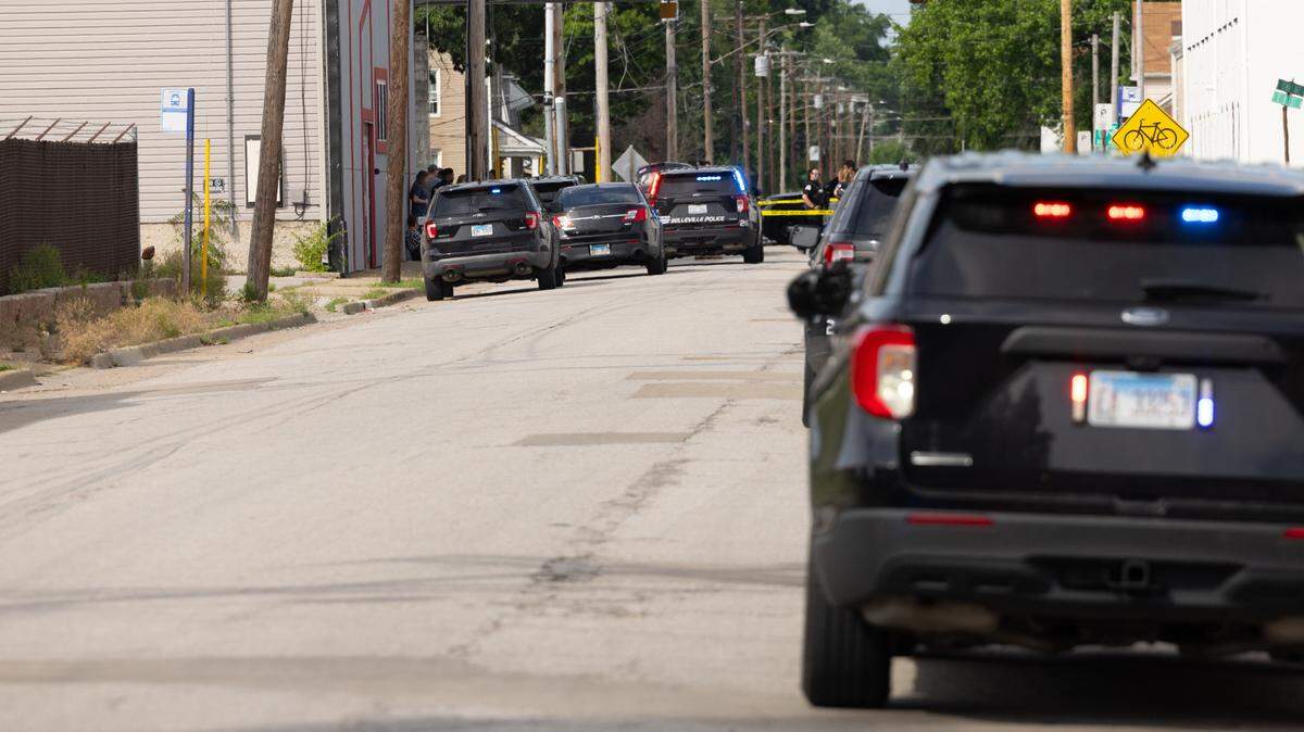 At the scene of an accident involving teenage bicyclist along East B Street in Belleville on Tuesday.