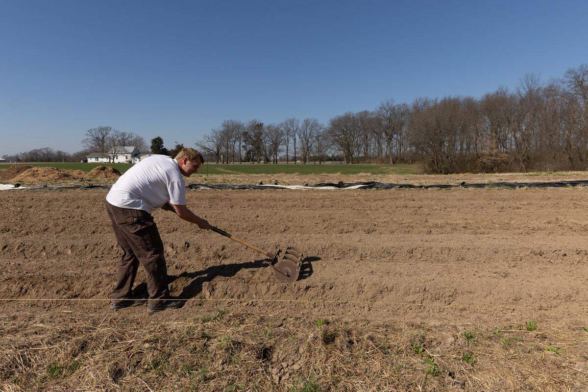 Ben Stumpf of Rumblin’ Ernie Farm in Columbia, Ill. hand-plows a field during the phase of spring sewing. Most of Stumpf’s tools are hand-operated, but a grant from Local Food Purchase Assistance Cooperative Agreement Program allowed him to purchase some tractor implements.