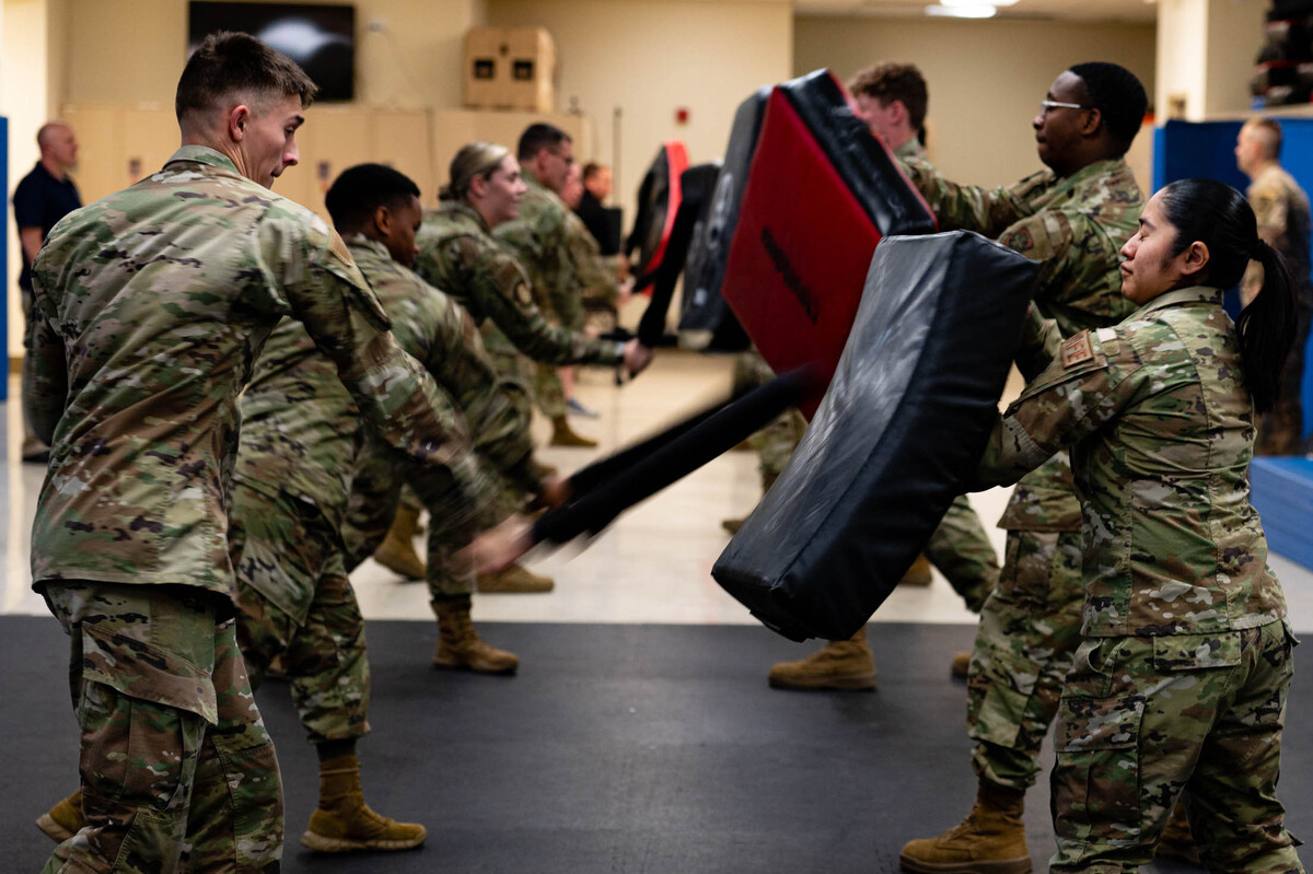 U.S. Air Force Airmen from the 375th Security force Squadron train augmentees on proper batons techniques on Scott Air Force Base. During the training, First Term Airmen Course students were briefed on skillsets outside their career fields to become combat ready Airmen.