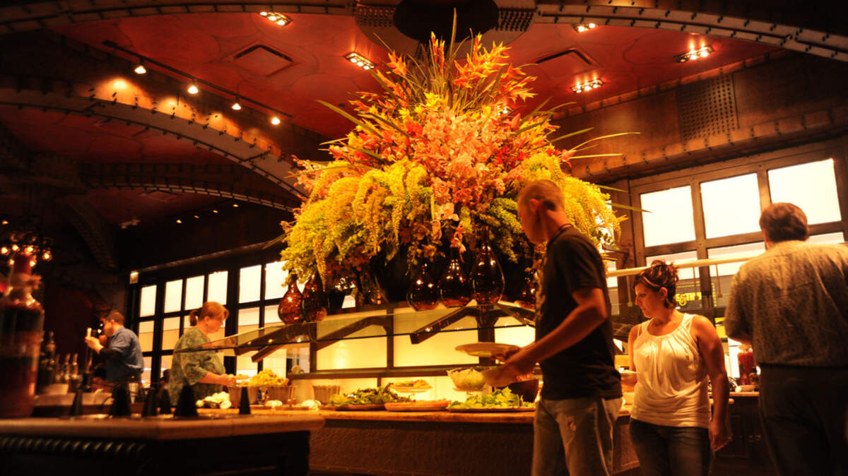Guests are seen at the salad bar of the Texas de Brazil restaurant in Schaumburg, Illinois near Chicago.