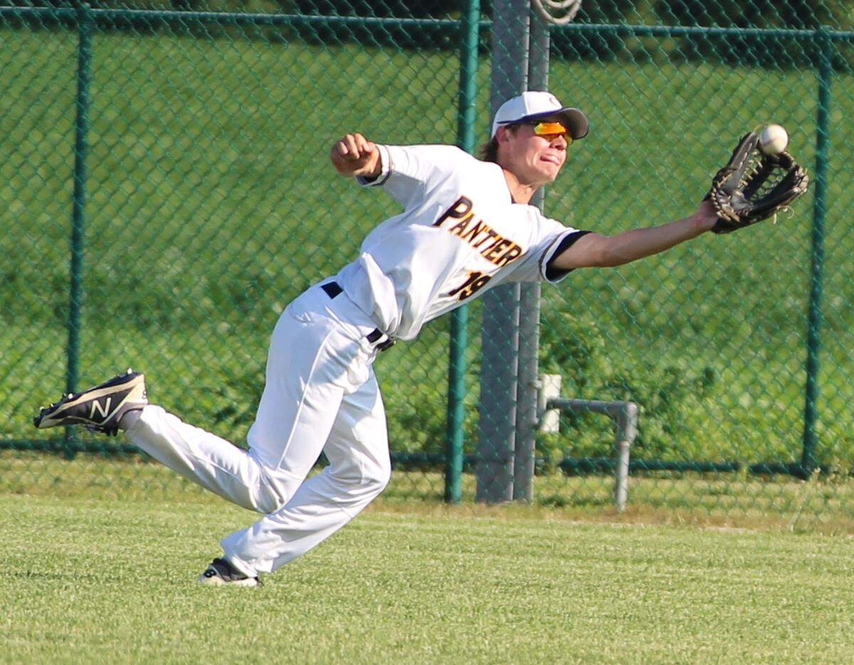 O'Fallon senior Quinn Lowery makes a diving catch in right field to steal extra bases away from a Belleville East hitter during the class 4A sectional semifinal Wednesday.