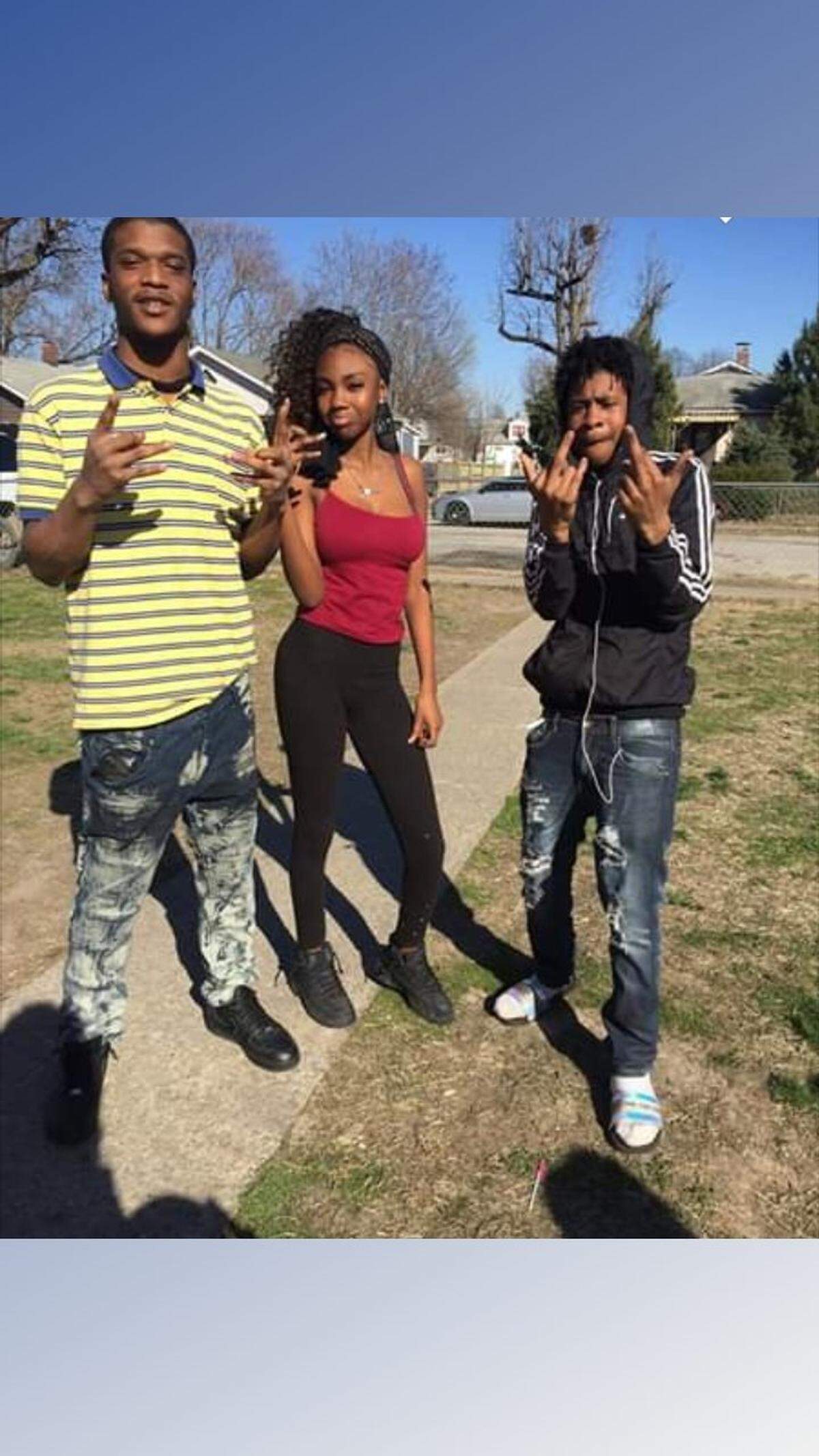 Demarcus Redmond, left who was injured in the shooting that took the life of his 15-year-old cousin, Omarion Coleman, on July 8.