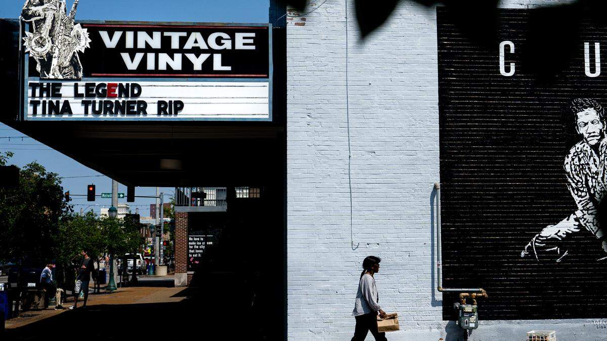 June Canada, of Fairview Heights, walks past Vintage Vinyl on Wednesday, May 24, 2023, on the Delmar Loop in University City. Canada said she didn’t previously know Tina Turner, St. Louis’ ‘Queen of Rock ‘n’ Roll,’ had died. “I’m sad to hear that,” she said. “I just loved her.”