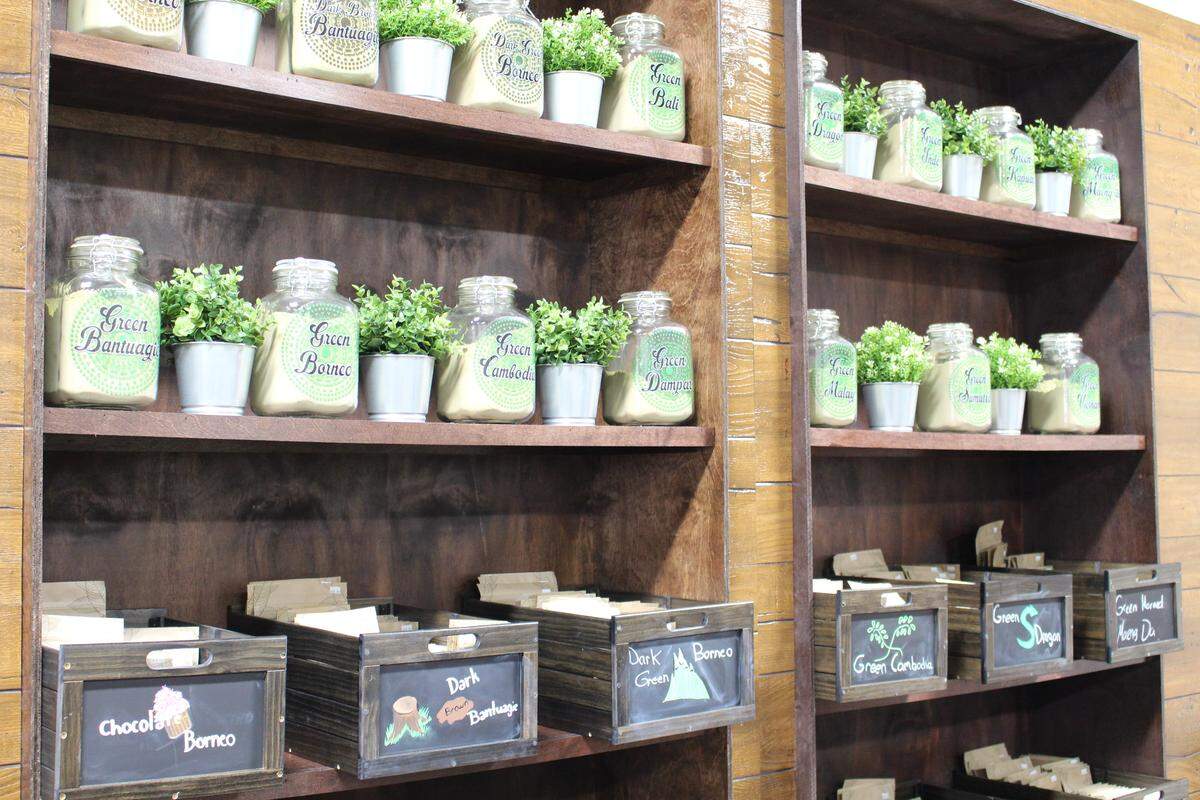Jars of kratom powder and capsules line shelves behind the counter at the CBD Kratom store in Belleville in this 2019 photo.