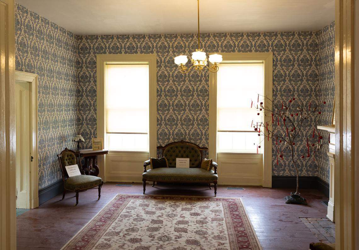 Volunteer Tom Bell did most of the work restoring the formal parlor of the Gustave Koerner House in Belleville. He had to follow strict guidelines to make it as historically accurate as possible.