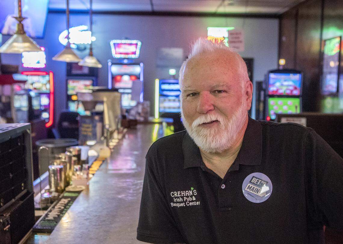 Barry Gregory, owner of Crehan’s Irish Pub and Banquet Center in Belleville, is pictured last year with video-gaming machines that are available for his customers to use.
