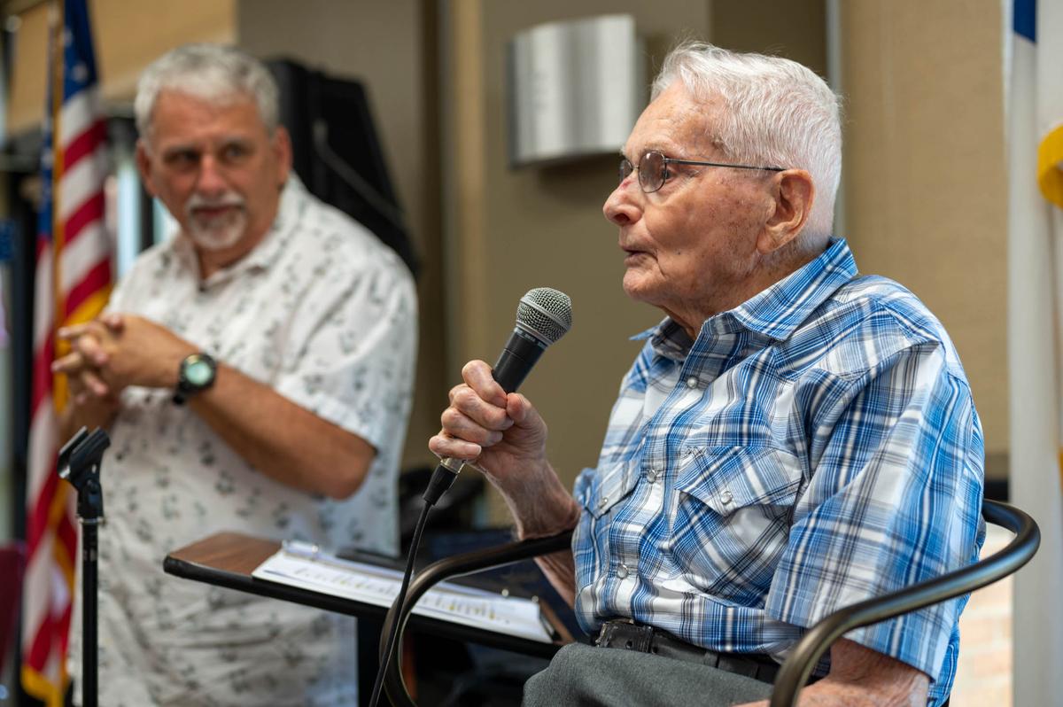 Clifford Good, World War II veteran, recalls memories of WWII during his birthday celebratory luncheon Aug. 28 at the First Baptist Church in O’Fallon. Good developed and printed pictures with his brother prior to WWII and served as an aerial photographer during his time in the military.